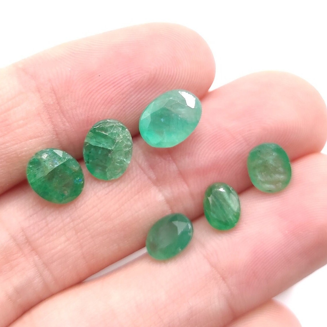 7.75ct Lot of Faceted Green Emeralds - Zambia