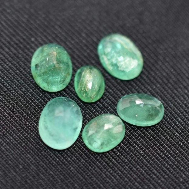 7.75ct Lot of Faceted Green Emeralds - Zambia