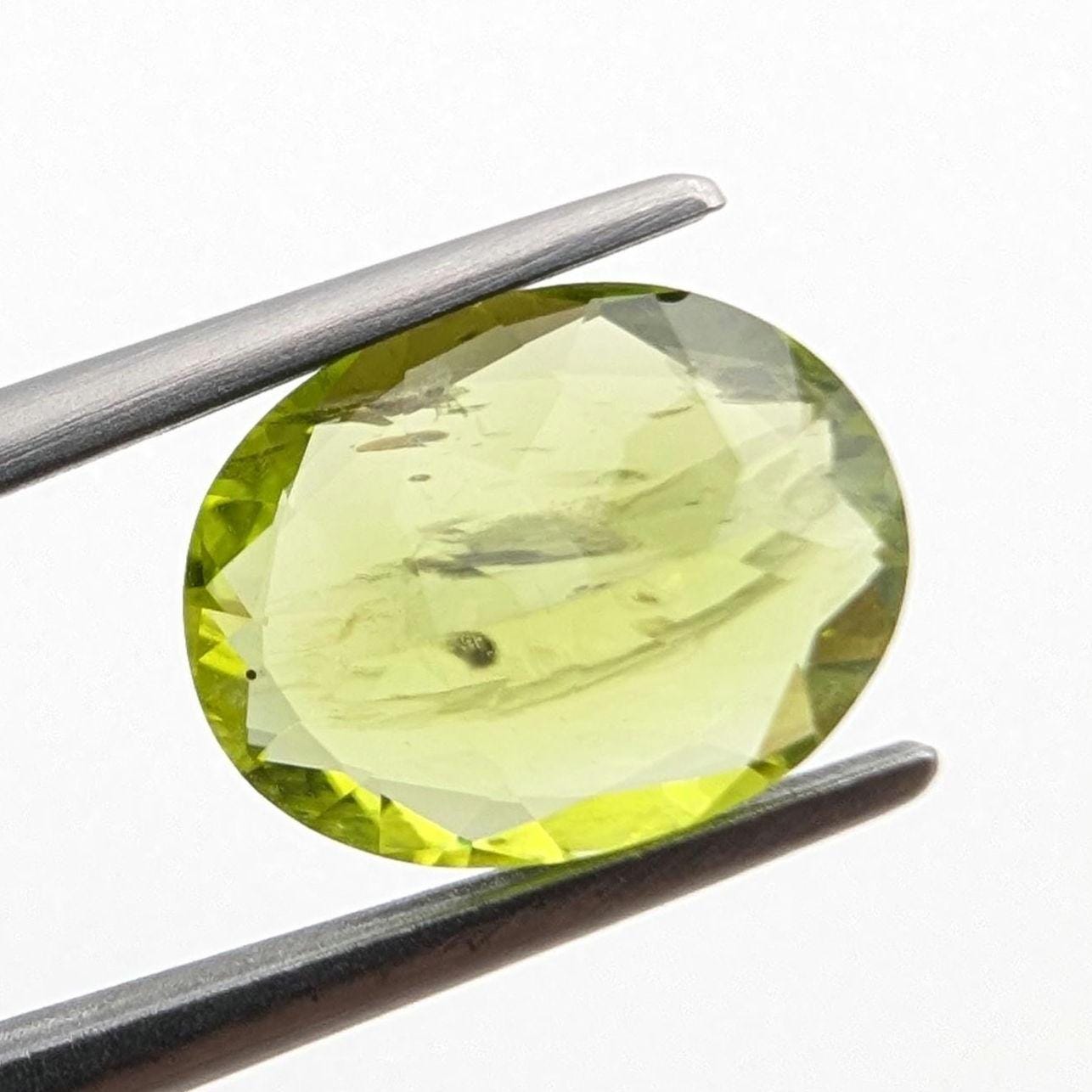 3.01ct Natural Peridot Gemstone - Oval Faceted Fancy Cut Peridot - Jilin Province, China - Natural Green Peridot with Inclusions - Loose Gem