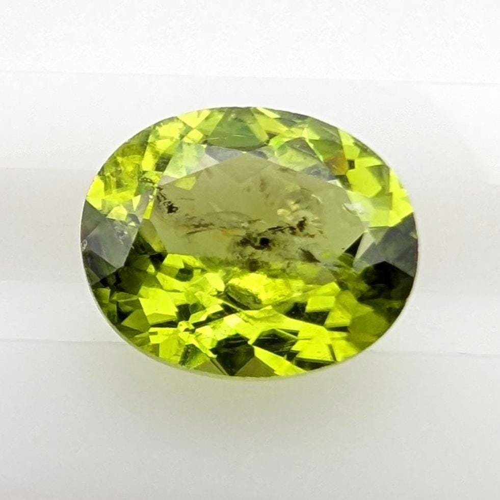 3.90ct Natural Peridot Gemstone - Oval Faceted Fancy Cut Peridot - Jilin Province, China - Natural Green Peridot with Inclusions - Loose Gem