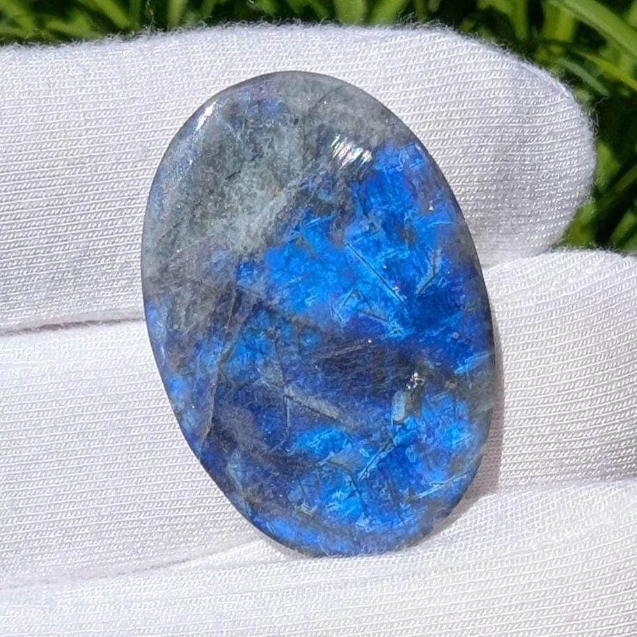 23ct Blue Flash Canadian Labradorite - Tabor Island, Nain, Labrador, Canada - Oval Cabochon - The Original Labradorite